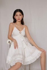 Lightweight organza mini dress with ruffle trim and adjustable tie shoulder straps
